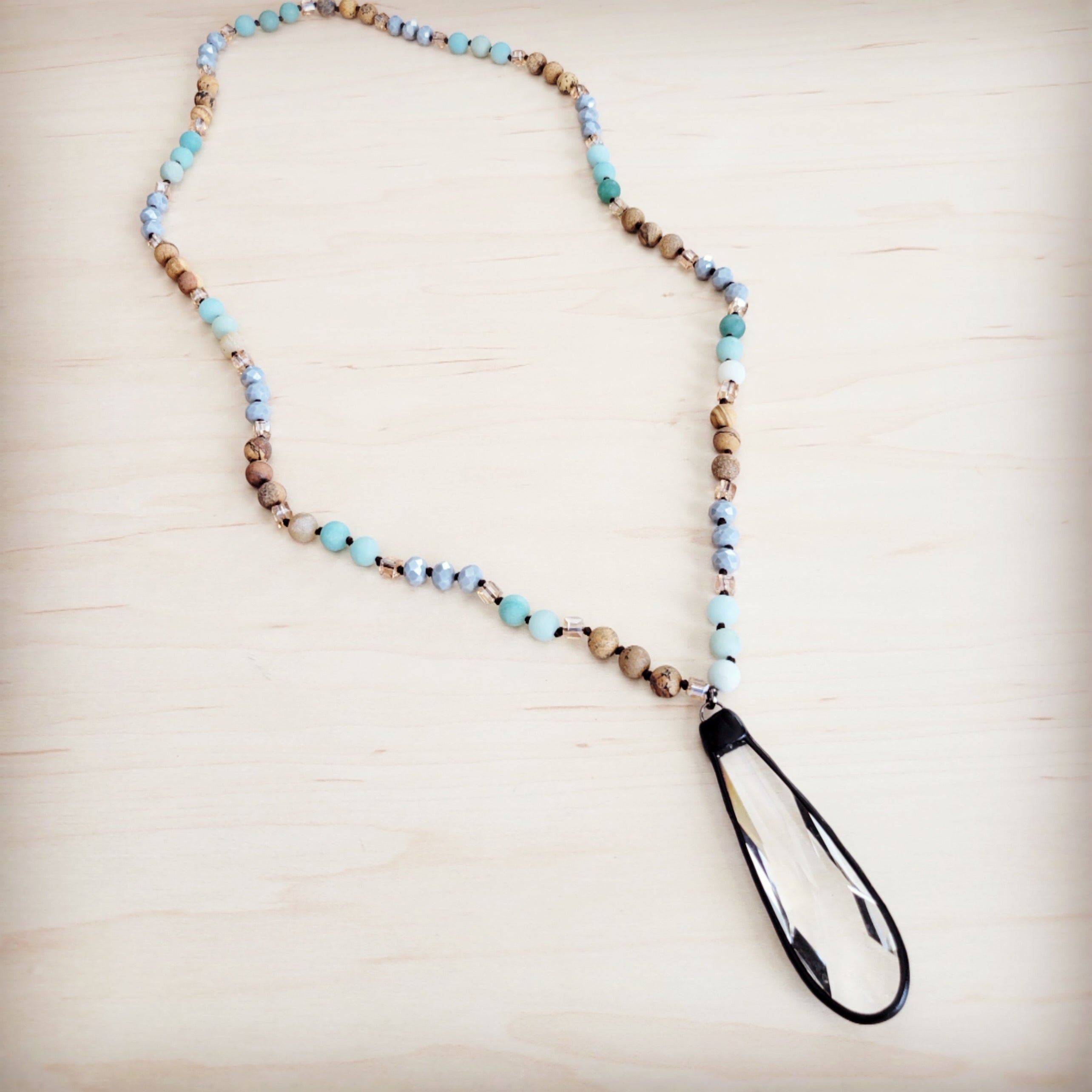 Long beaded necklace featuring Amazonite and Picture Jasper beads with a clear crystal teardrop pendant