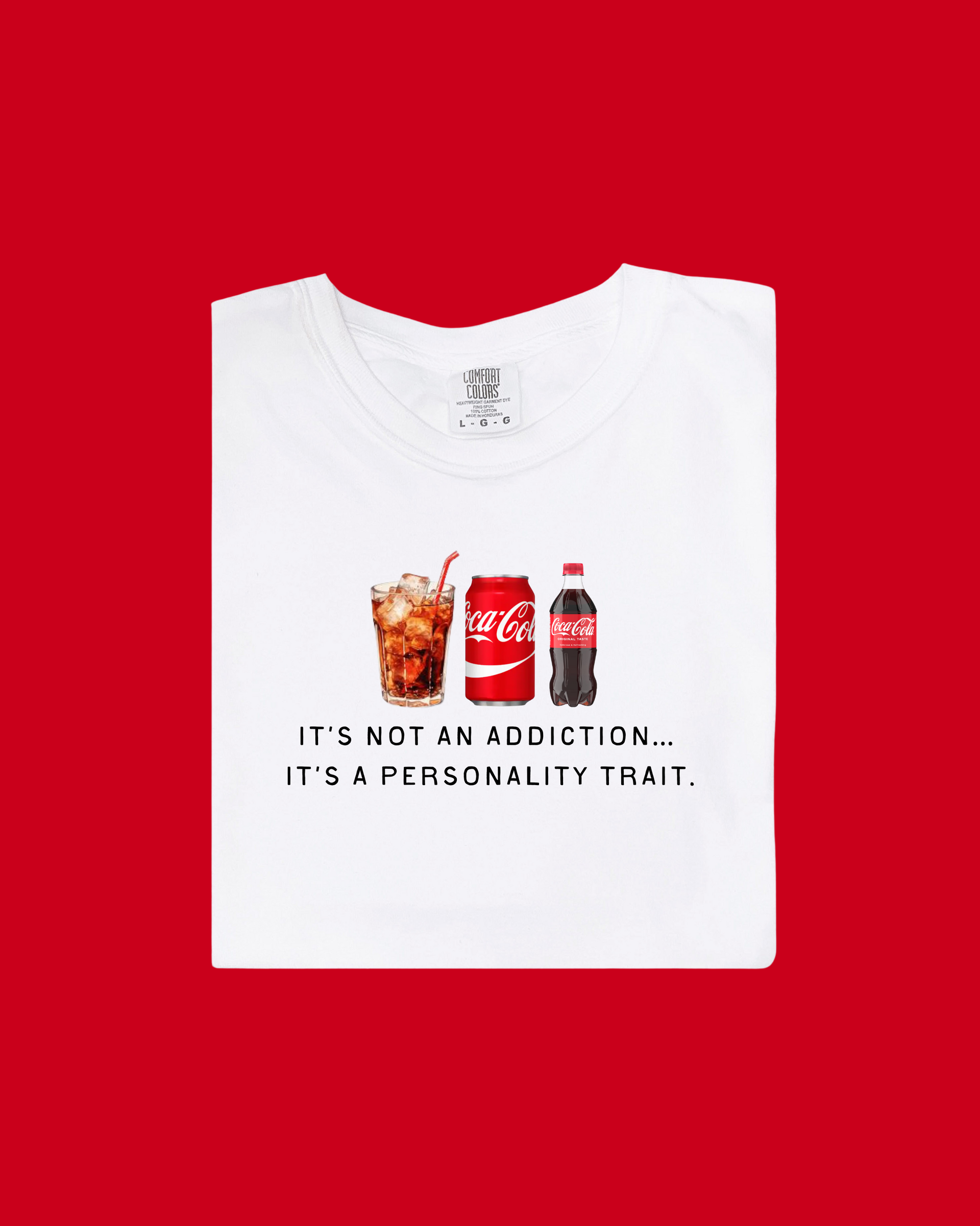 A red and white unisex graphic tee with the text It's Not An Addiction, It's A Personality Trait.