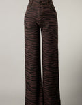 Close up of 100% cotton camel colored pants styled for a casual look
