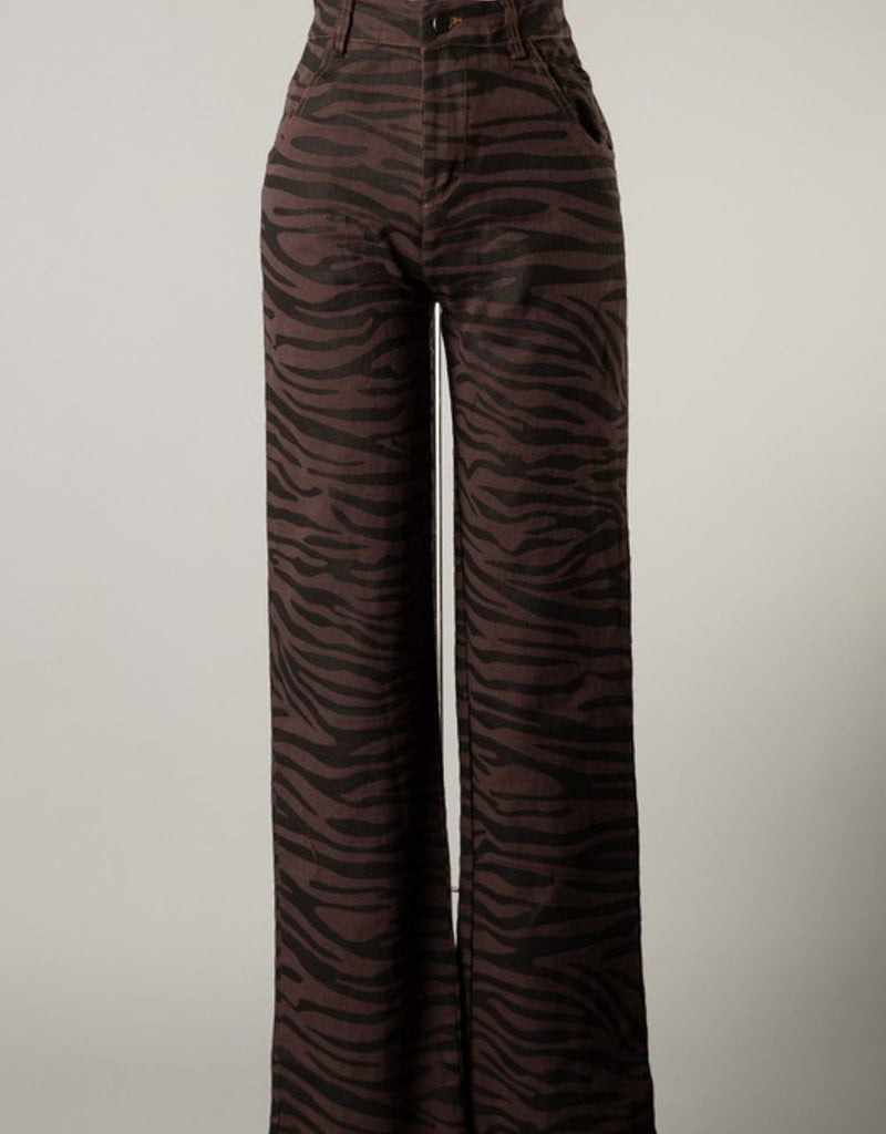 Close up of 100% cotton camel colored pants styled for a casual look