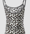 Model wearing a modern white, black, and brown leopard print knit tank top.
