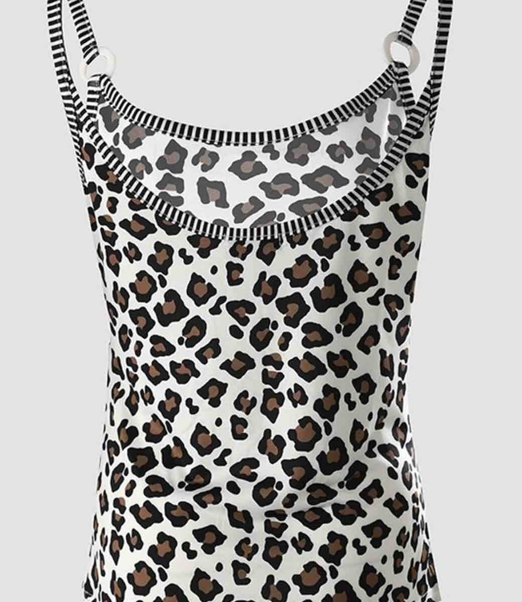 Model wearing a modern white, black, and brown leopard print knit tank top.
