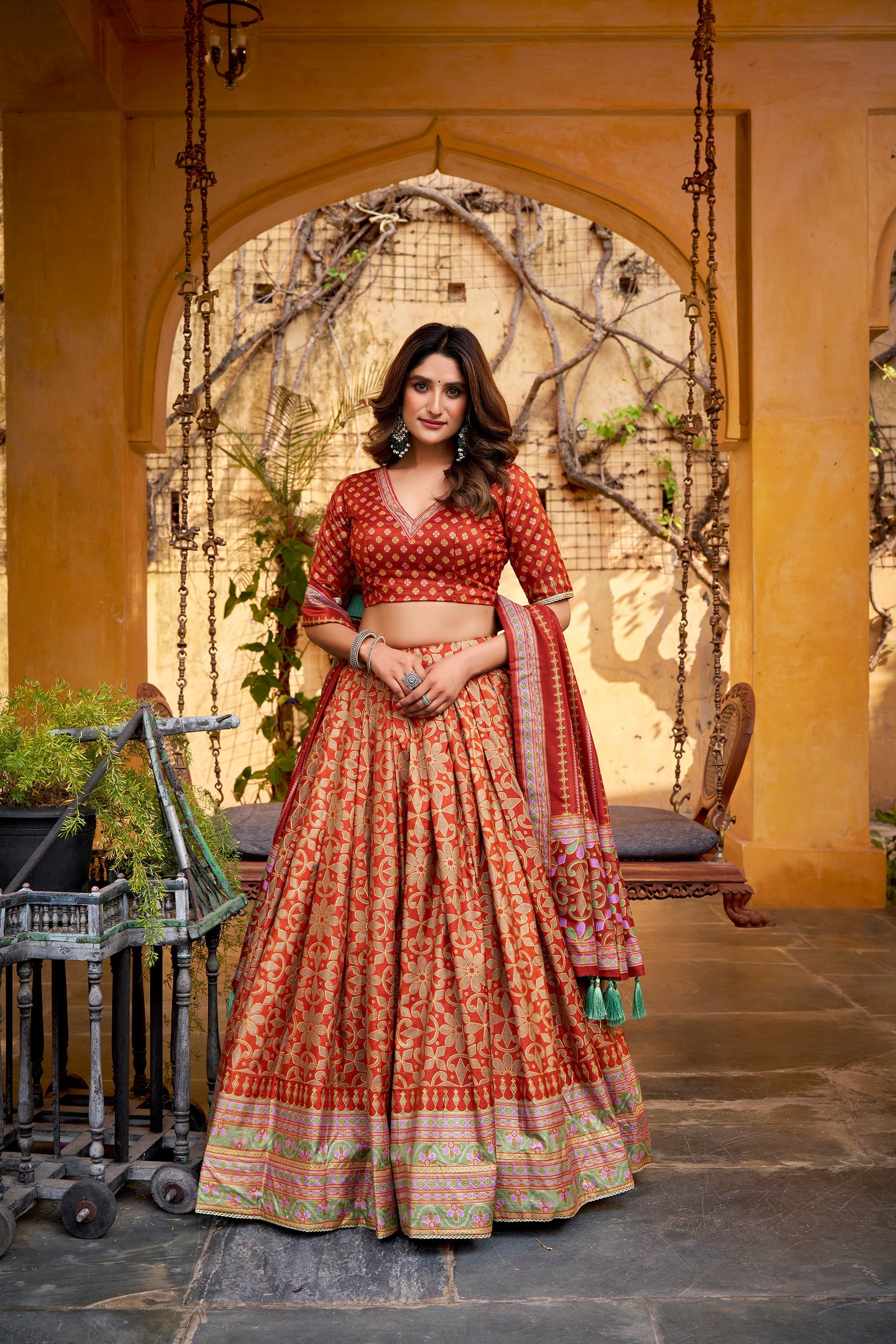Orange Tussar silk lehenga choli with sparkle detailing and lace border