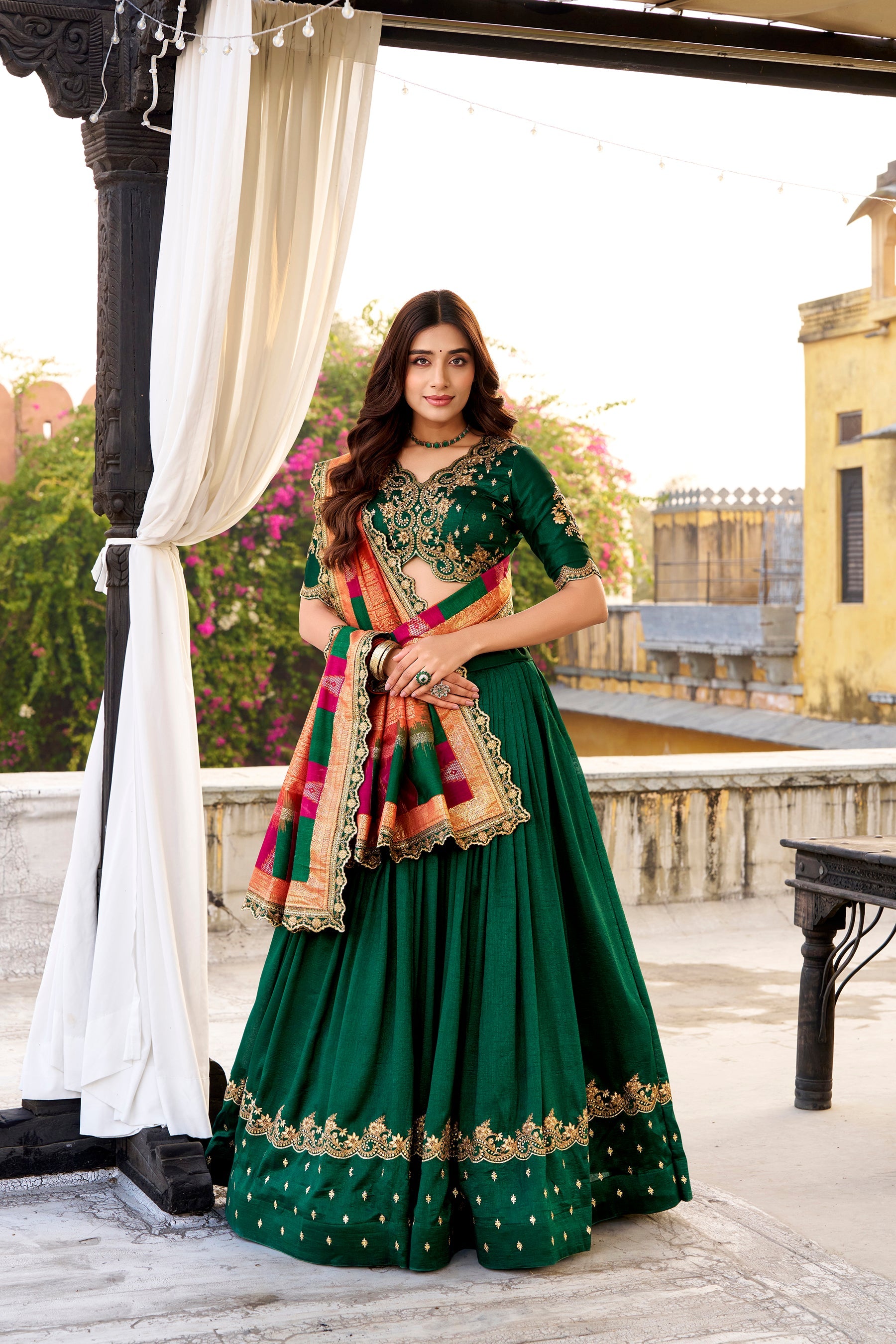 Green Vichitra silk lehenga choli with intricate sequins and embroidery