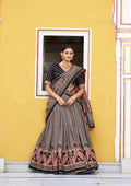 Black Tasar Silk printed lehenga choli with lace border and sparkle details