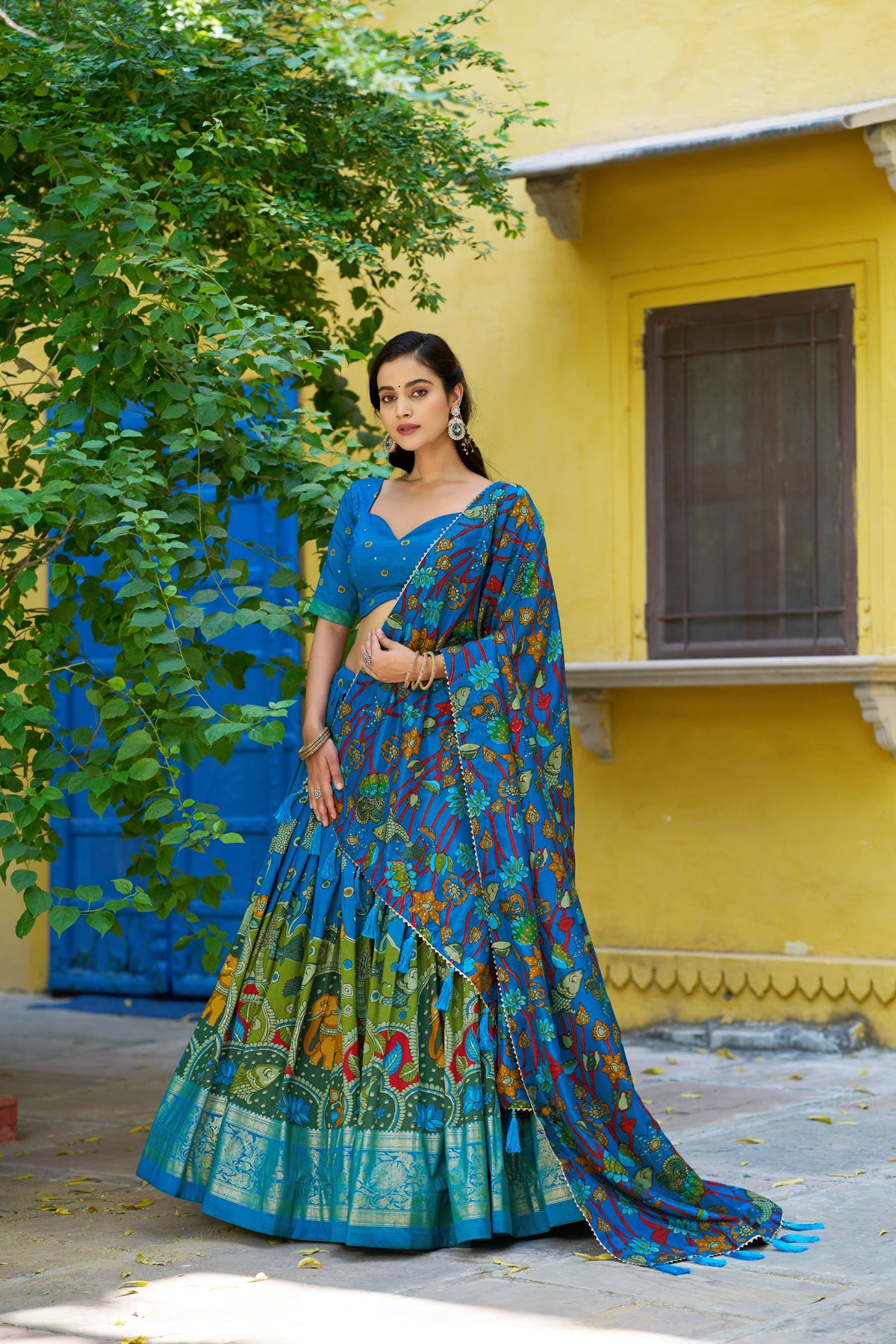 Multicolor Tussar silk lehenga choli with traditional Kalamkari print and gold foil border