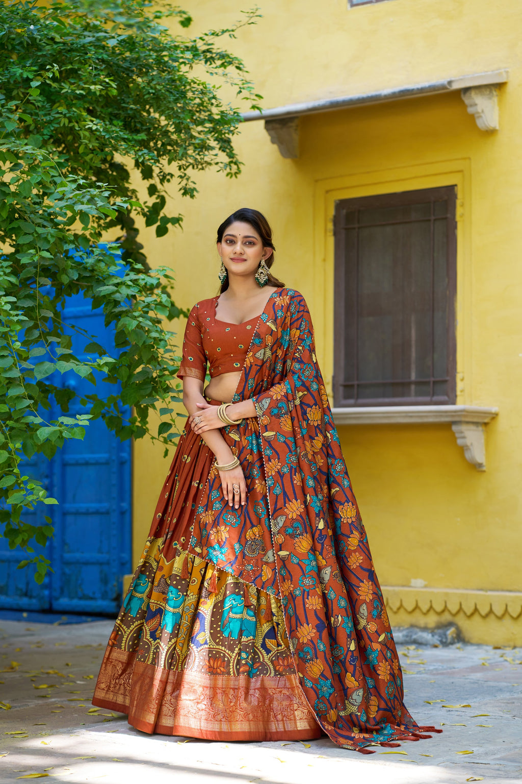 Multicolor Tussar Silk lehenga choli with Kalamkari print and foil work border