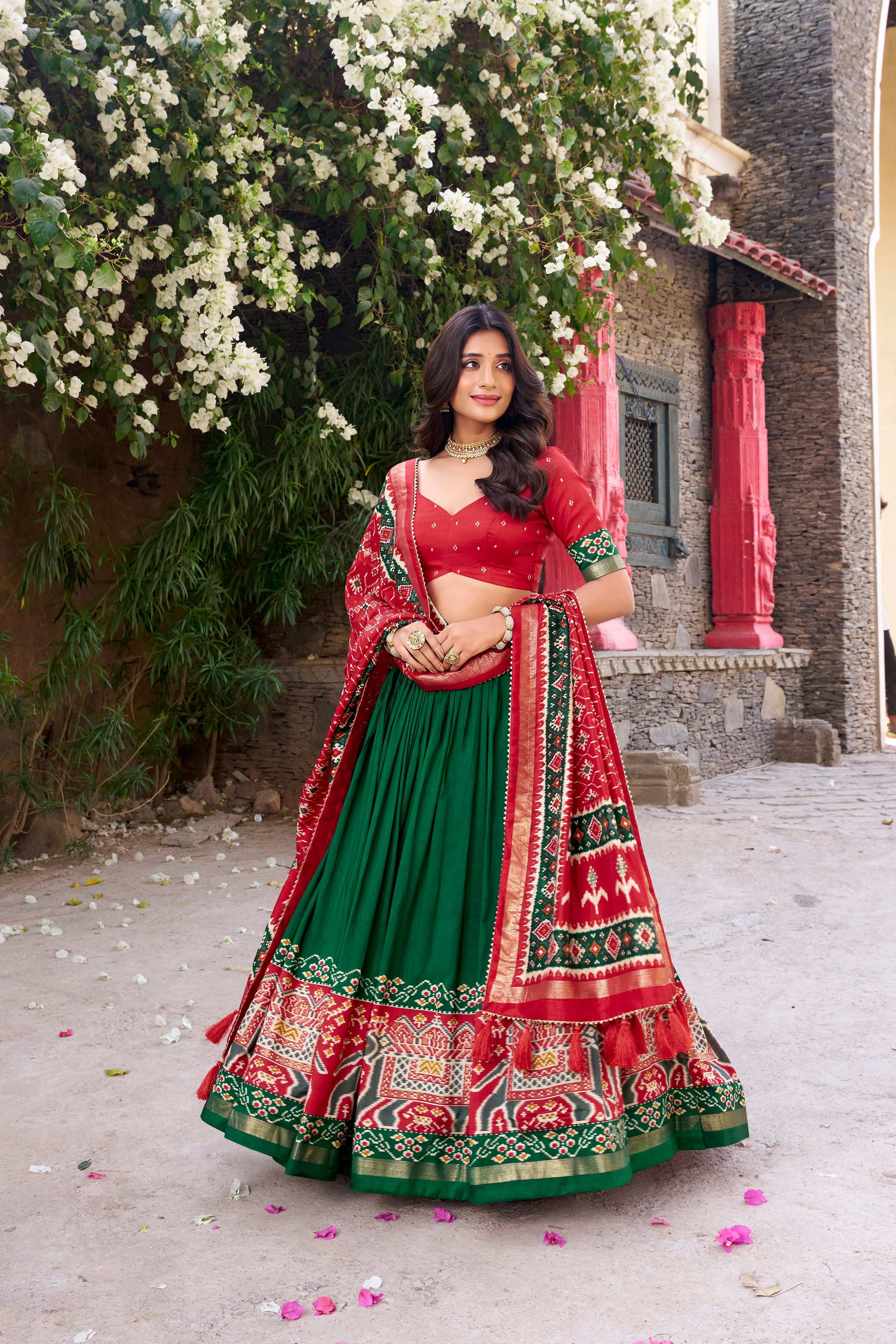 Green Tussar Silk Patola Printed Lehenga Choli with Foil Work