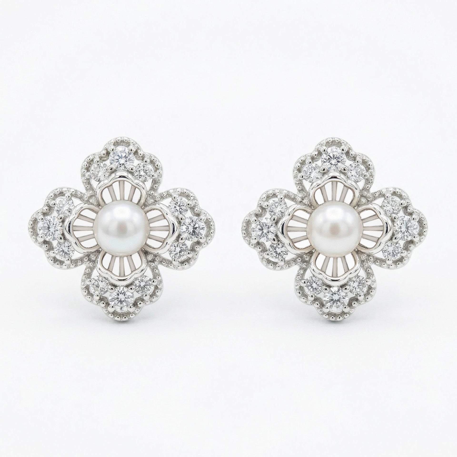 925 Sterling Silver Elegant Floral Pearl and Sparkling Accent Stud Earrings in White Metal