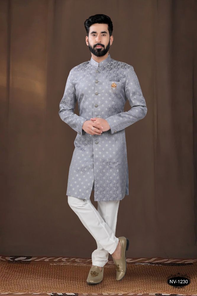 A stylish grey woven jacquard kurta paired with white pyjamas for boys