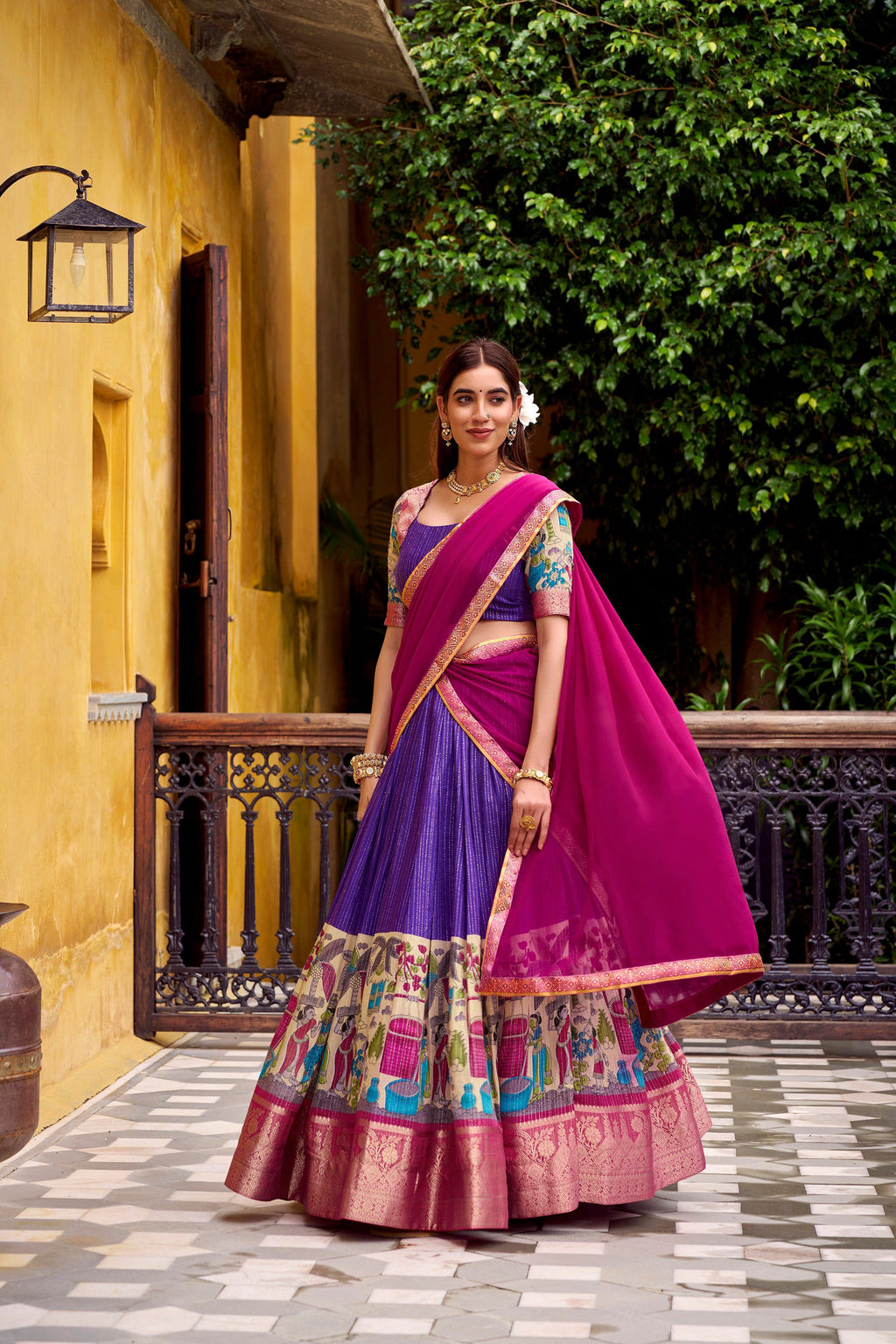 Purple and gold poly chanderi lehenga choli with traditional kalamkari prints and zari weaving.