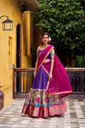 Purple and gold poly chanderi lehenga choli with traditional kalamkari prints and zari weaving.