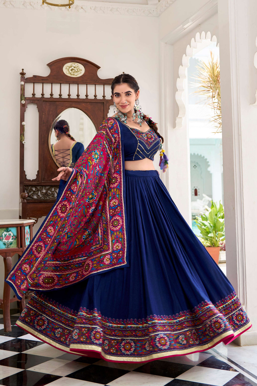 Navyblue Tasar Silk Lehenga Choli with multi-color Gamthi print and Gotta Patti lace detailing