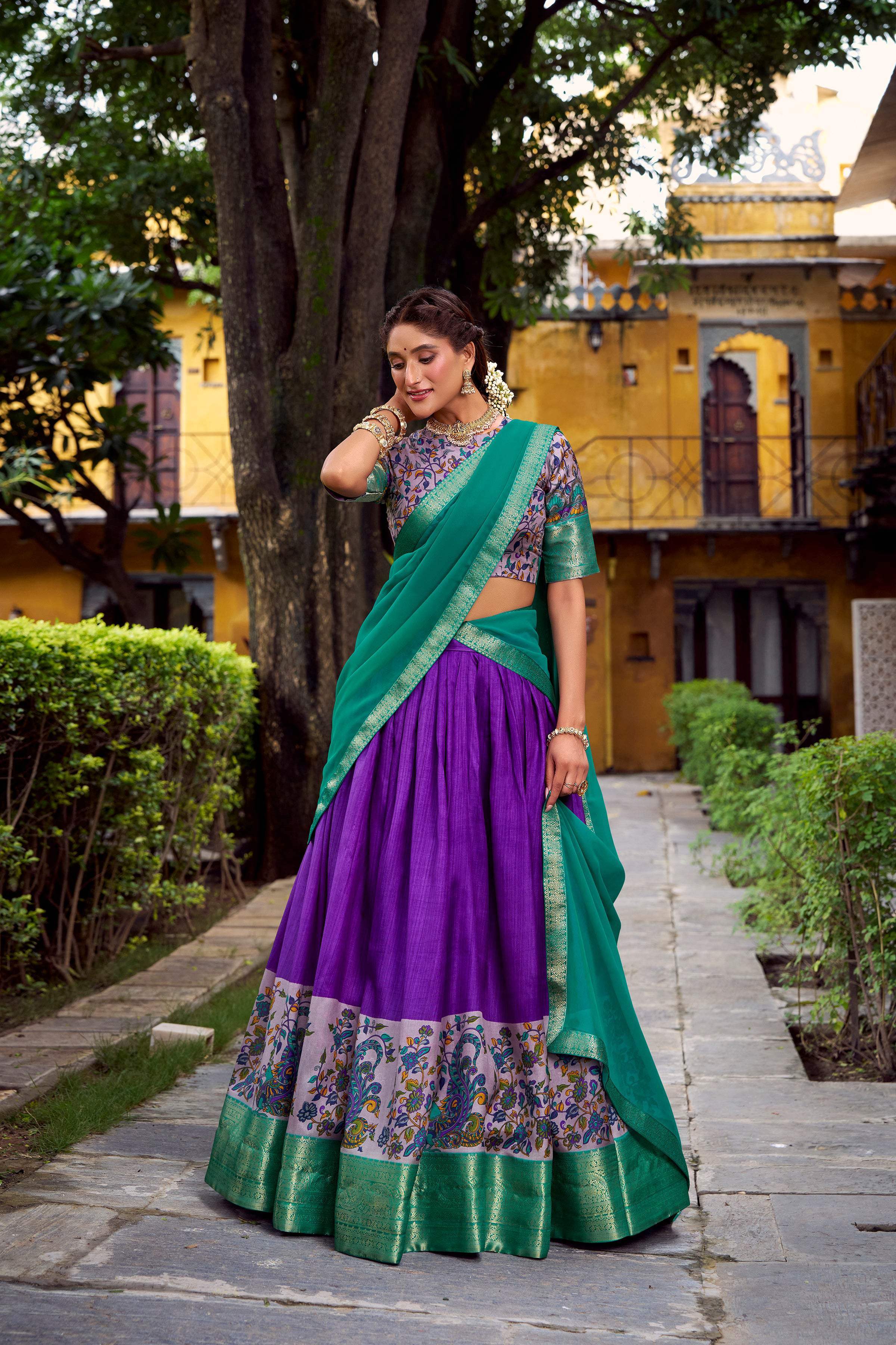 Purple Aastha Silk lehenga choli with print patterns and zari weaving accents