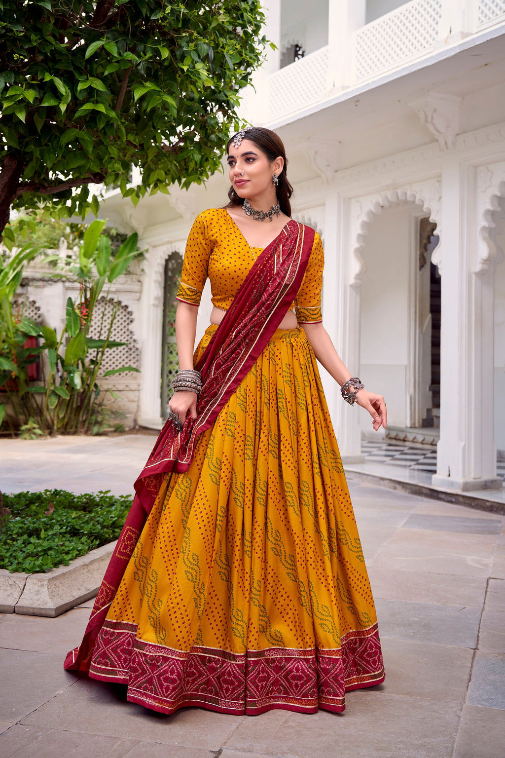 Yellow Tasar Silk Bandhej Lehenga Choli with Gotta Patti Lace
