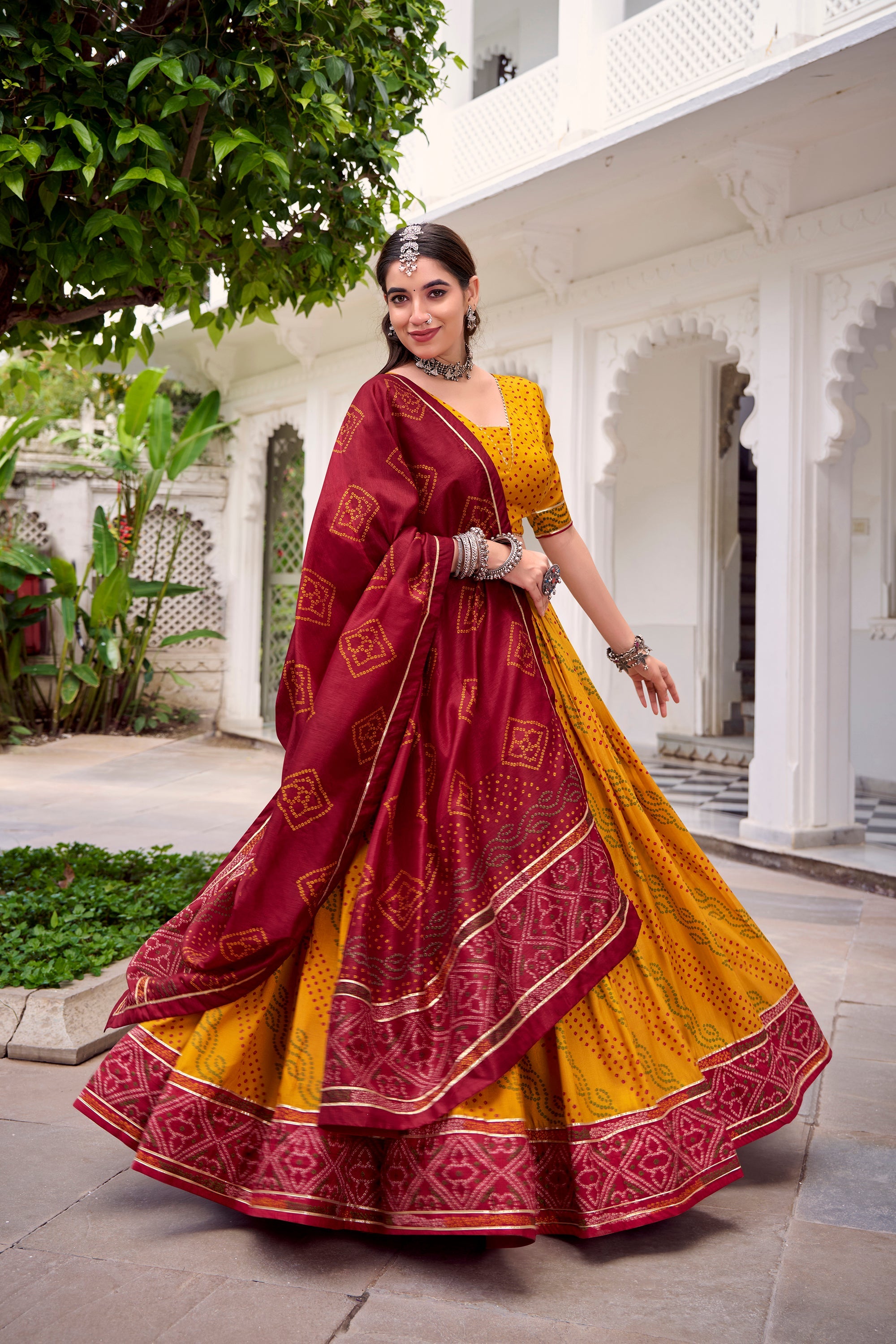 Yellow Tasar Silk Bandhej Lehenga Choli with Gotta Patti Lace