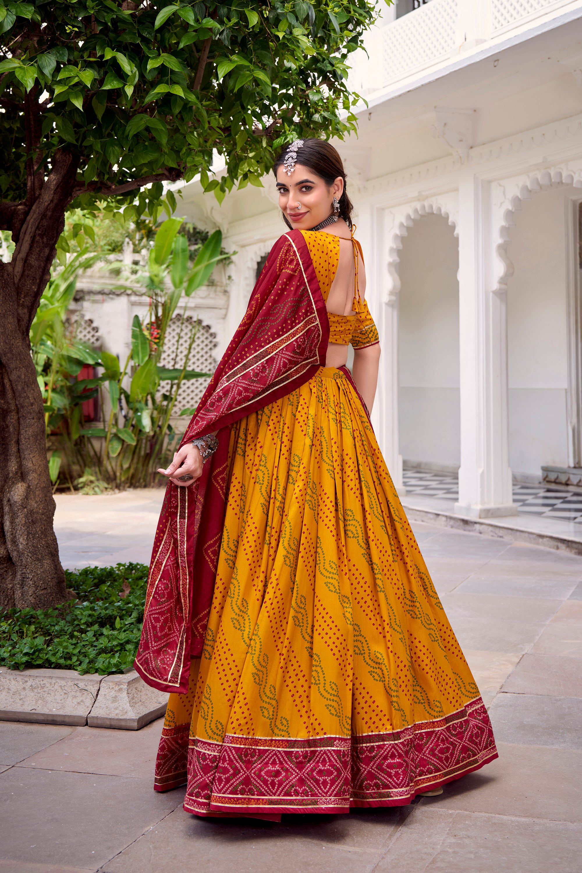 Yellow Tasar Silk Bandhej Lehenga Choli with Gotta Patti Lace