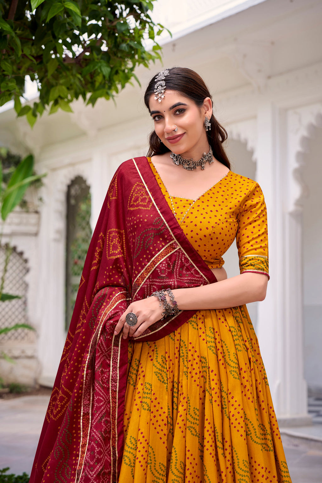 Yellow Tasar Silk Bandhej Lehenga Choli with Gotta Patti Lace