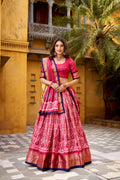 Gajari Dola Silk Lehenga Choli with intricate Batik print and Zari weaving work.