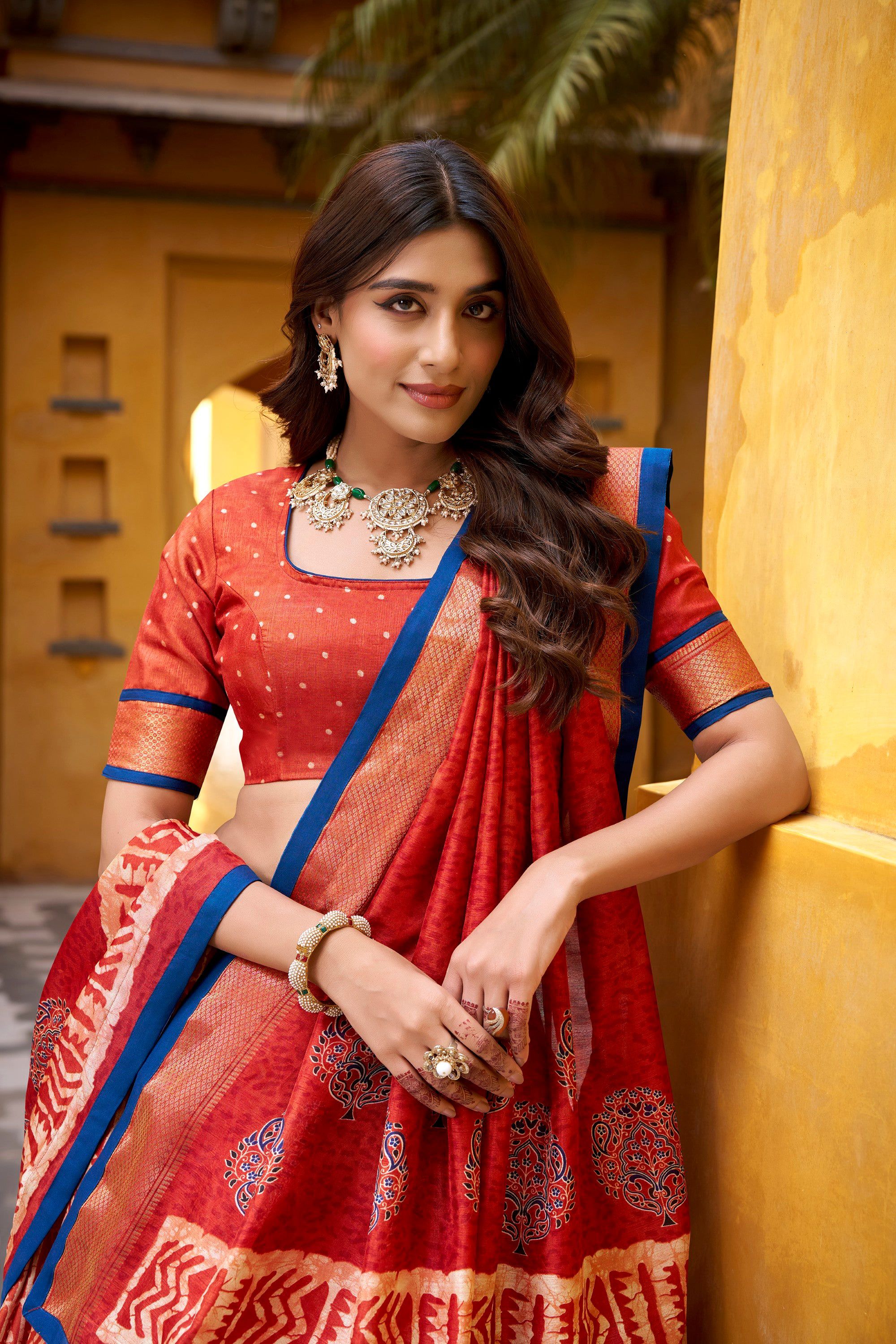 Rust Dola Silk Batik Print Lehenga Choli with Zari Weaving