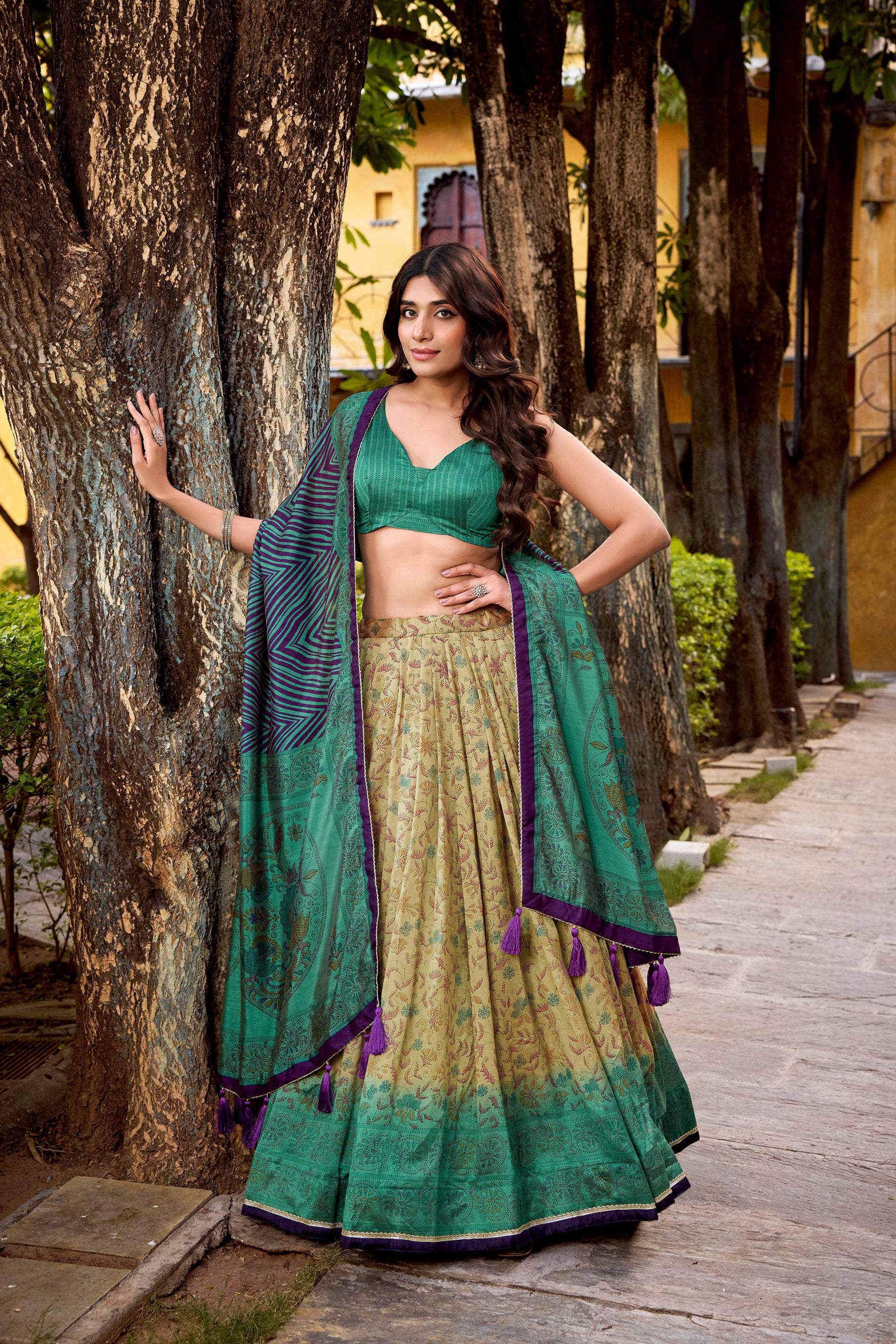 Multicolor printed Vichitra silk lehenga choli set with a coordinating dupatta.