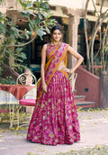 Pink Tasar silk lehenga choli with gilded foil printed motifs and matching dupatta.
