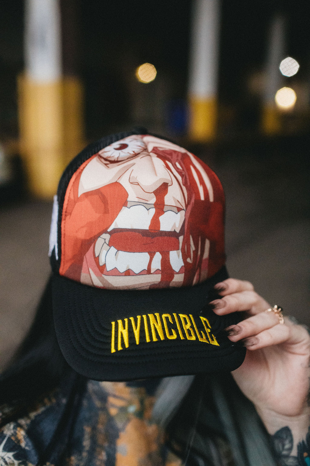 Invincible Face Smasher Graphic Trucker Hat in Black - Image 6