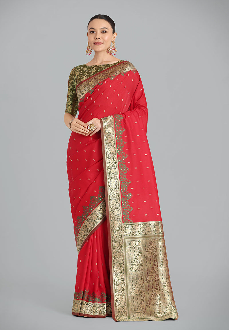 A vibrant red Banarasi silk saree with intricate golden zari weaving and a traditional designer pattern.