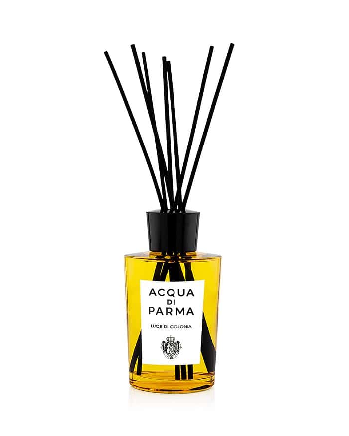 Acqua di Parma Luce Di Colonia 6 oz room diffuser in amber glass bottle with black rattan reeds