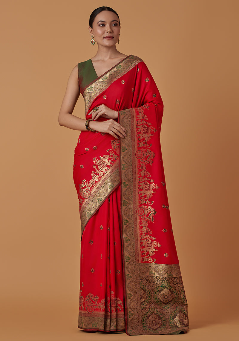 Red Banarasi silk blend saree with traditional Dulha Dulhan figure zari woven detailing