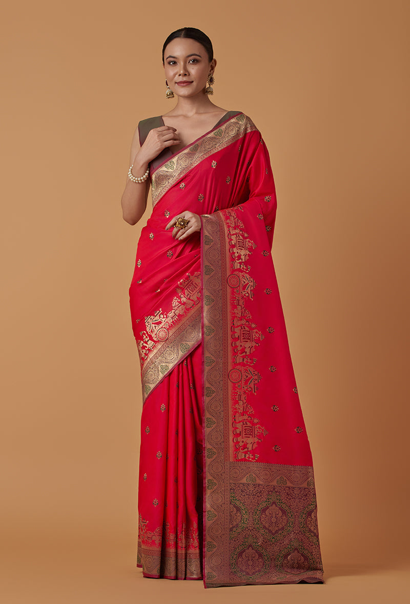 Pink Banarasi silk blend saree featuring detailed Dulha-Dulhan zari woven motifs