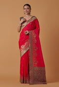 Pink Banarasi silk blend saree featuring detailed Dulha-Dulhan zari woven motifs
