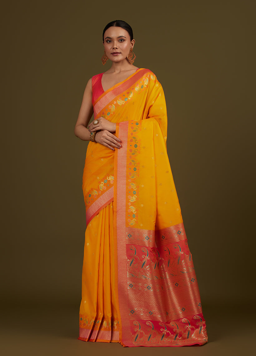 Yellow Banarasi Silk Blend Saree featuring traditional paisley patterns and a gold zari pallu