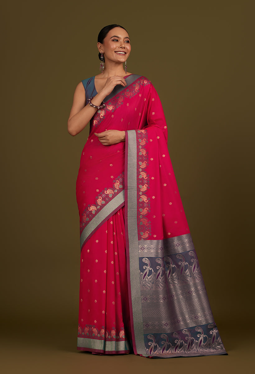 Pink Banarasi silk blend saree with traditional paisley patterns and a heavy zari pallu