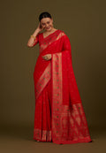 Elegant red Banarasi silk blend saree with intricate gold zari woven brocade motifs