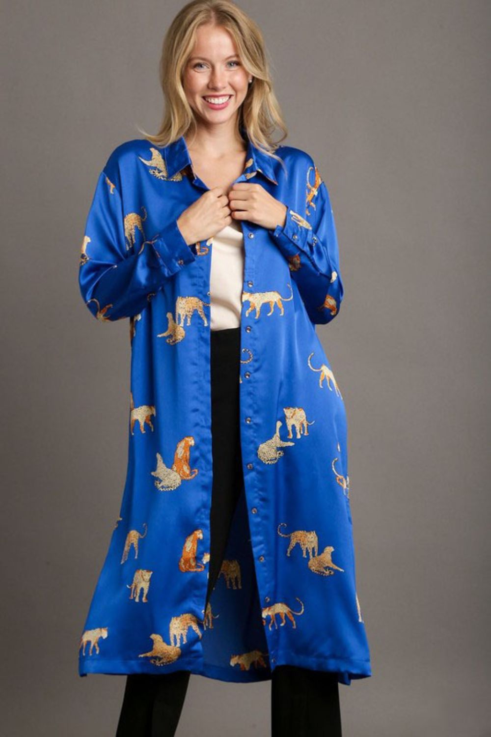 Bold animal print satin button-down midi shirt dress in blue, gold, and orange