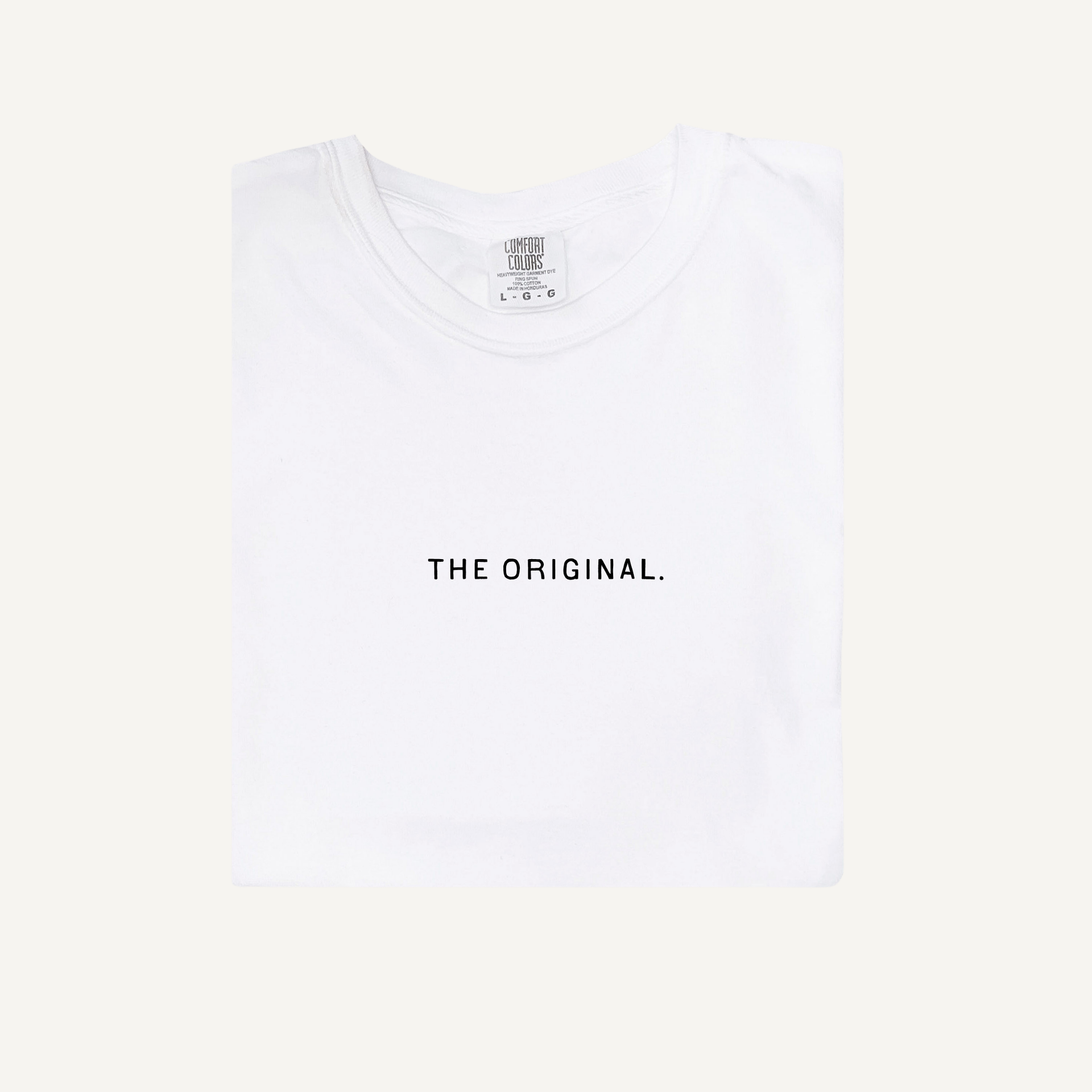 A flat lay of a heavyweight cotton unisex t-shirt in solid black against a neutral background.