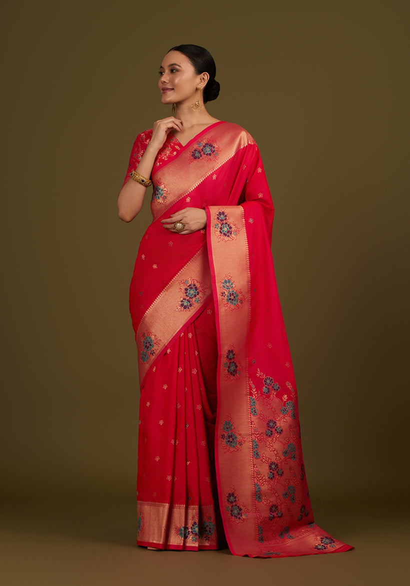 Pink silk blend saree with elegant zari floral motifs and woven detailing