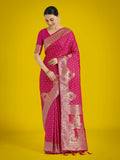 Rani Pink Banarasi Satin Silk designer saree with elegant zari woven details and matching unstitched blouse piece