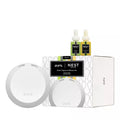 NEST x Pura 4 Smart Fragrance Diffuser set in white, green, and yellow packaging