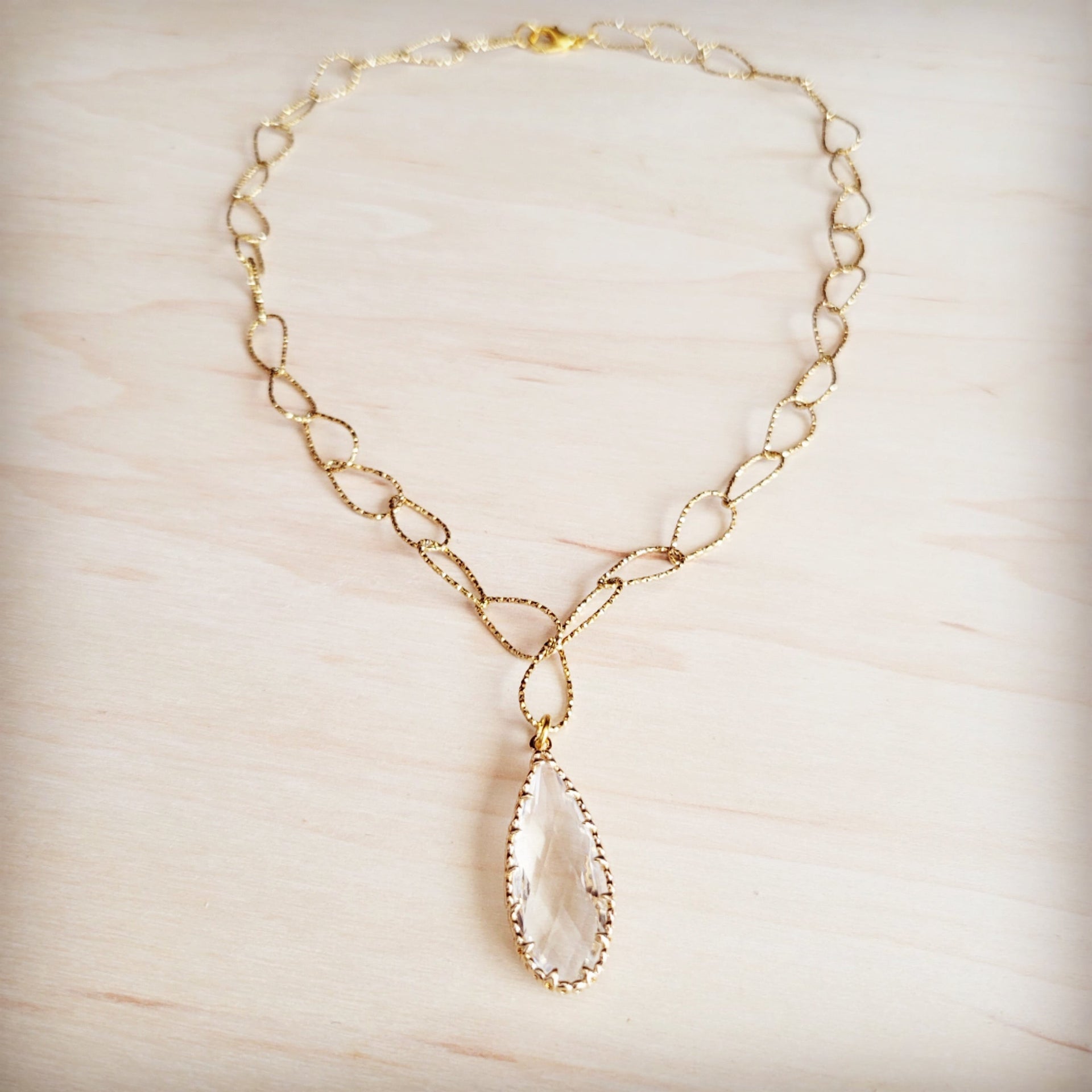 Gold-Tone Teardrop Pendant Necklace with Textured Oval Links - Image 2