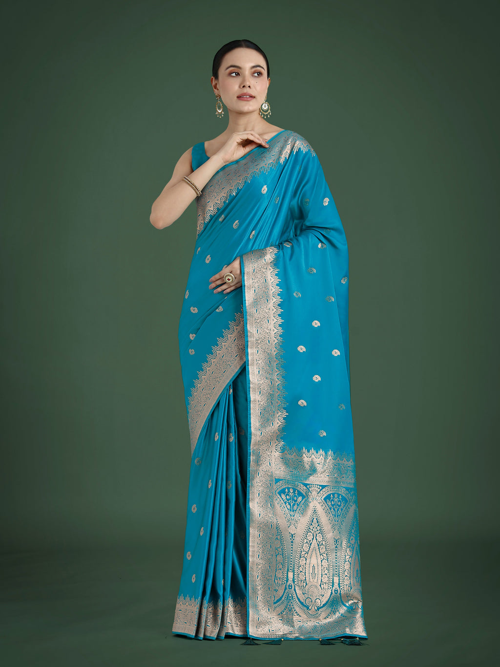Cyan blue Banarasi satin silk saree with gold Zari weaving detail and matching blouse piece.