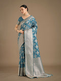 Cyan blue Banarasi Satin Silk saree featuring a rich, intricate gold Zari woven pallu