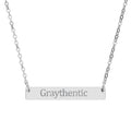 Minimalist silver horizontal bar necklace on a delicate cable chain