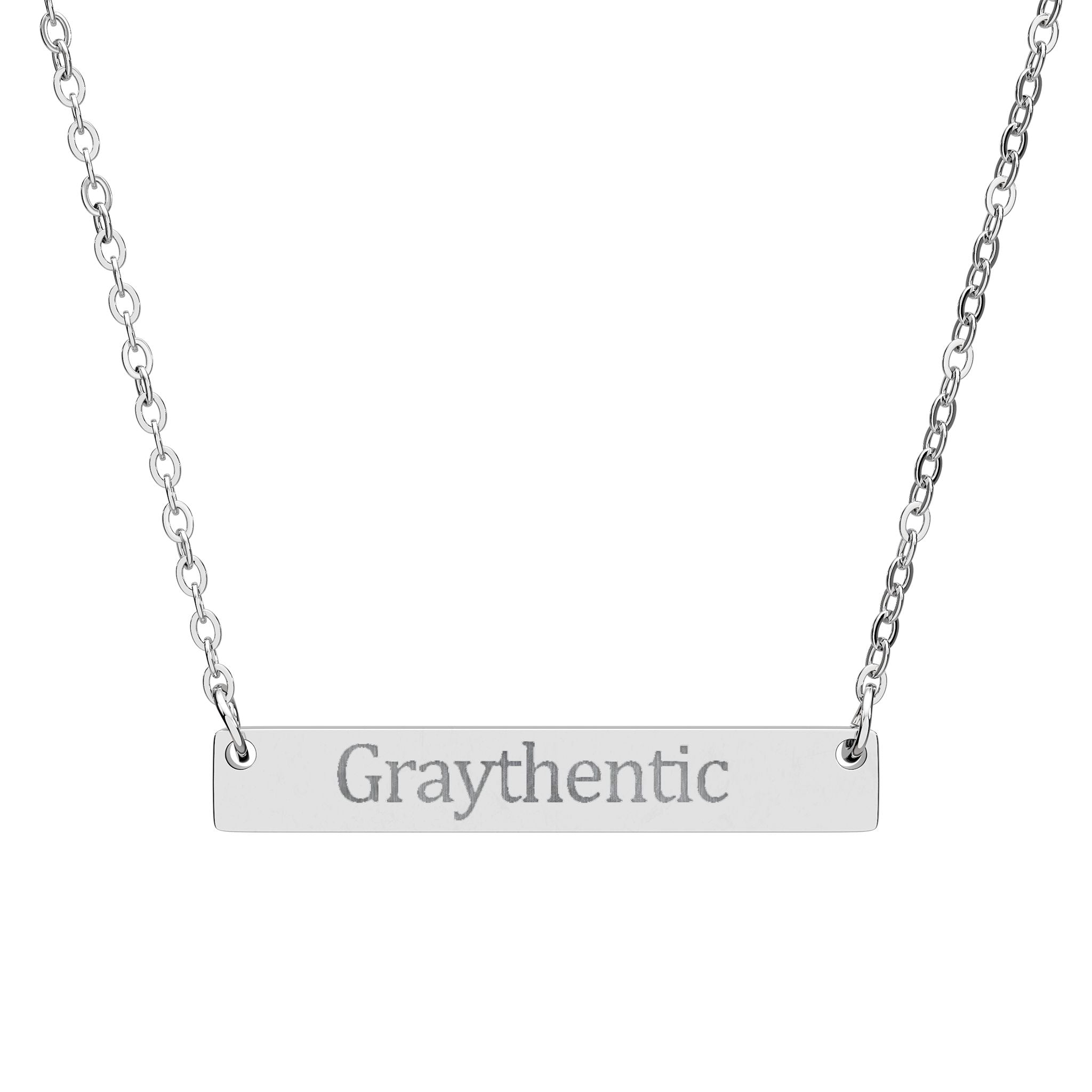 Minimalist silver horizontal bar necklace on a delicate cable chain