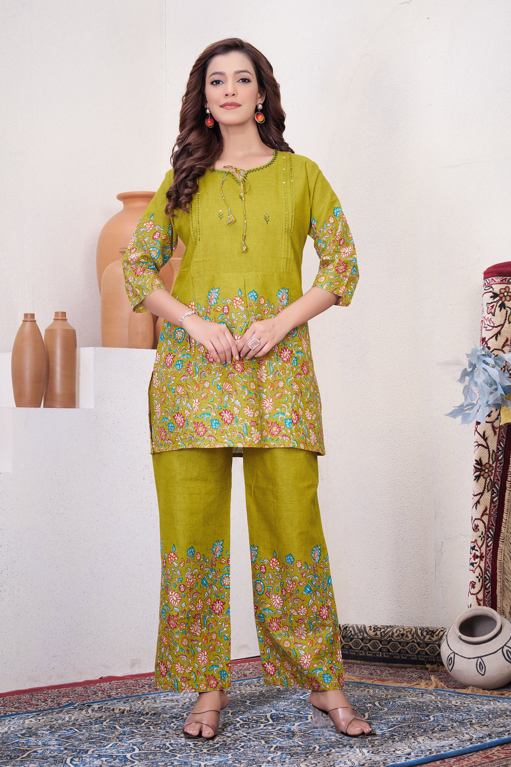 Model wearing a stylish parrot printed pure cotton co-ord set with 31-inch kurta length