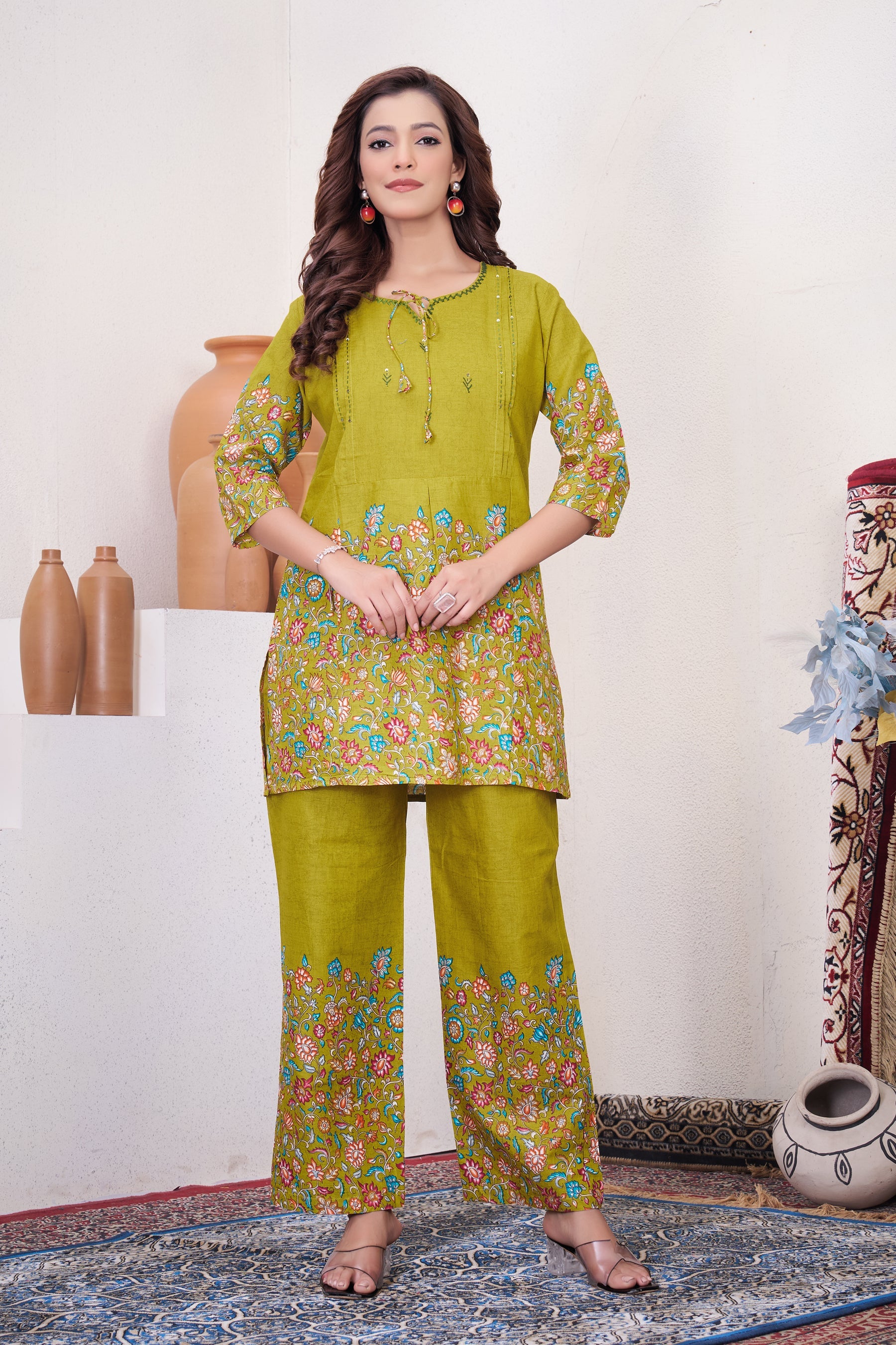 Model wearing a stylish parrot printed pure cotton co-ord set with 31-inch kurta length