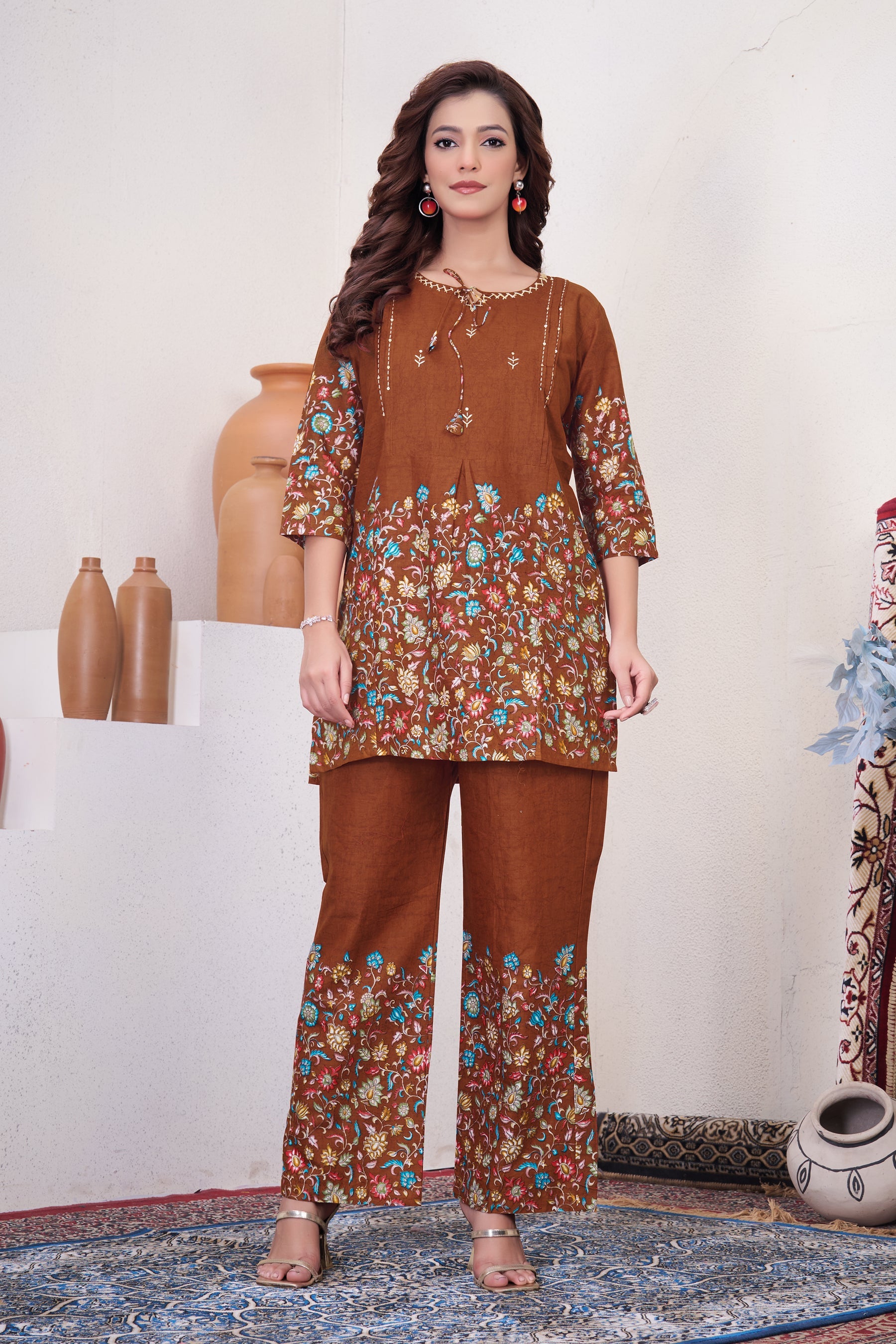 Woman wearing a Rust Pure Cotton Printed Co-Ord Set featuring a 31-inch kurta and elegant trendy design.