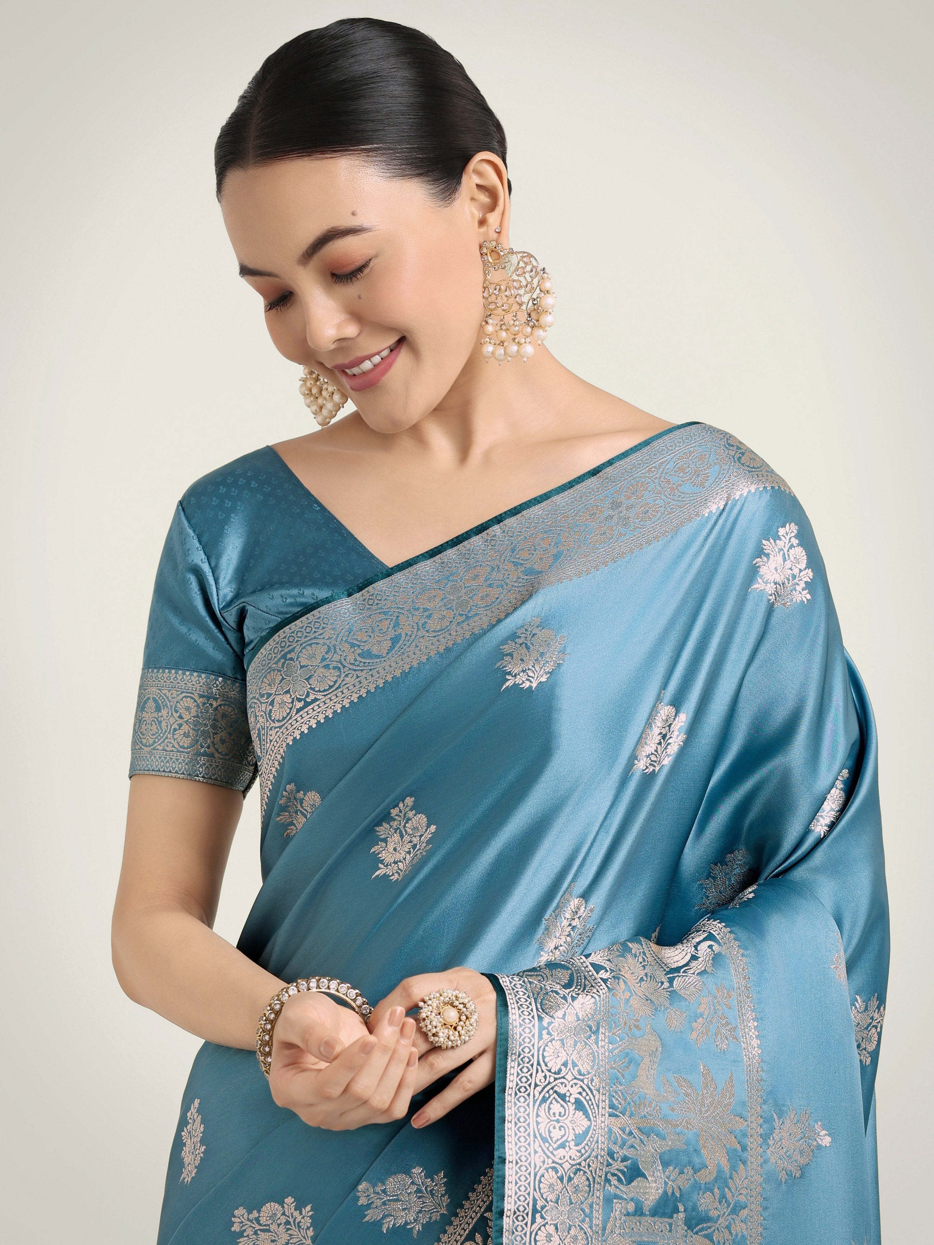 Cyan Blue Banarasi Satin Silk Saree with Zari Weaving Work
