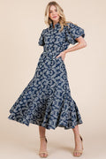 Close up of a leaf pattern eyelet lace dress with puff sleeves
